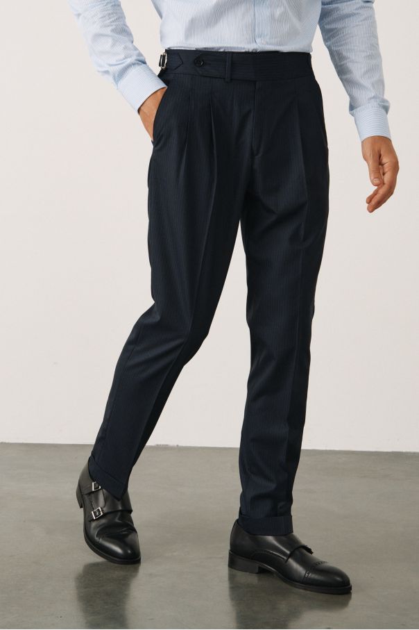 Брюки синие в тонкую полоску с защипами