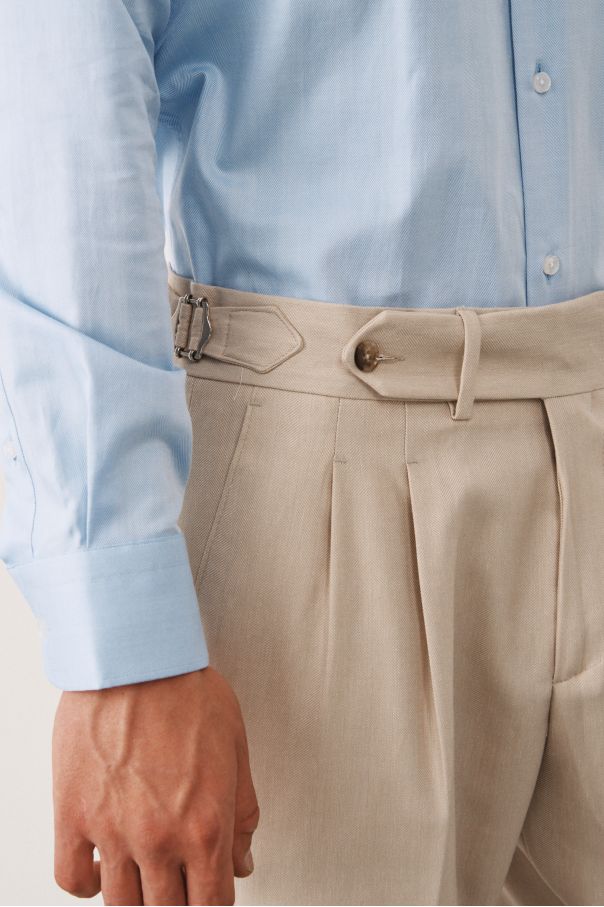 Брюки светло-бежевые, ткань в елочку, с защипами