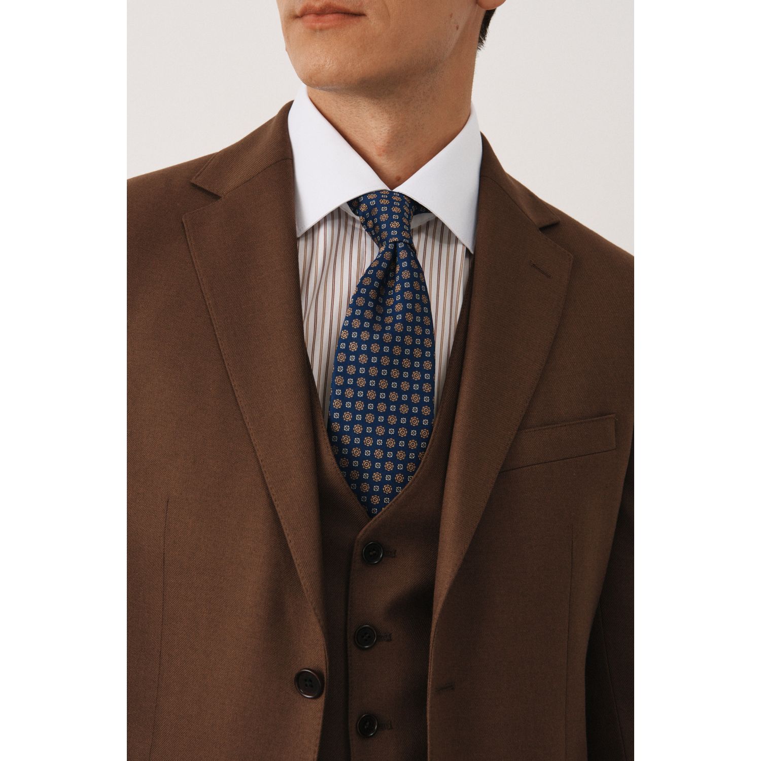 Галстук синий в мелкий коричневый узор